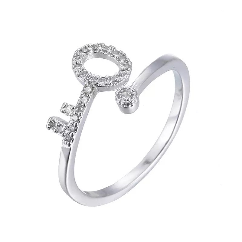 ADJUSTABLE KEY STERLING SILVER PLATED RING